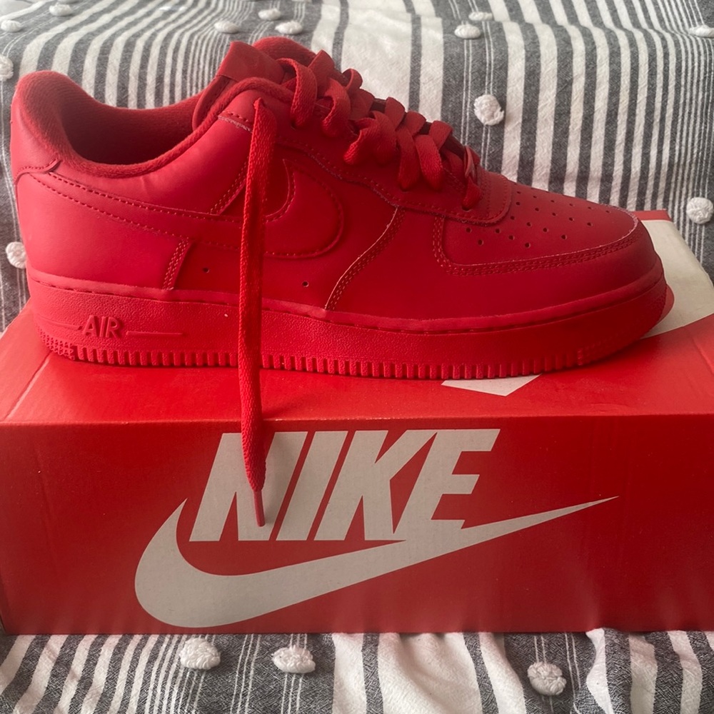 Red Air Force ones size 8 never worn. In perfect condition!